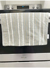 Laha’ole Home Pikake Lei Tea Towel in Grey Valia Honolulu
